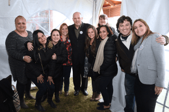 Elizabeth Perez, Michael Mulgrew, and Kate O'Hagen with District 21 educators.