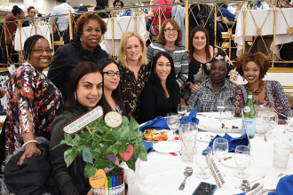 District 27 Representative Marilyn Manley (far left) and UFT Vice President for 