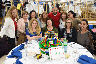 Educators from PS 51, an early childhood school in Richmond Hill, pose with thei
