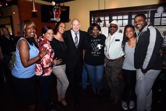 UFT members from PS 3, 4, 6 and Frederick Douglass Academy pose with UFT Preside