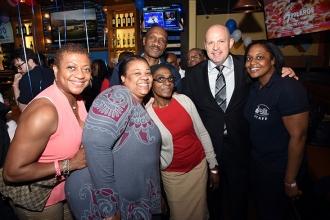 Staff from PS 306 with Mulgrew.