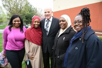 First year teachers from PS/IS 284 and PS 327 pose for a photo with Mulgrew.