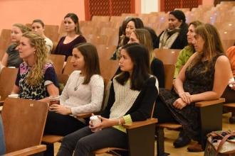 Educators pay rapt attention.