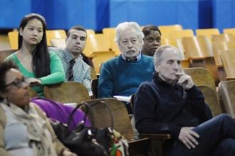 Staff members listen to Mulgrew’s report.