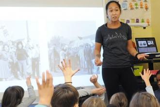 Sharon Rauceo, a 1st-grade teacher, leads her students during a history lesson a