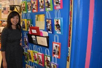 Kindergarten teacher Maple Li shows off the exhibit she has created