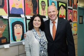 Esther Savitzky shows Mulgrew some of the students’ many art projects.