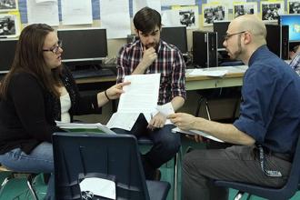 Reviewing student lab reports on photosynthesis.