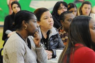 Teacher Monica Tejada (center) during the discussion.
