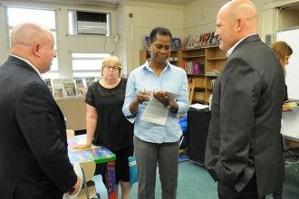 UFT District 25 Representative Joe Kessler (left) responds to a question from Ch