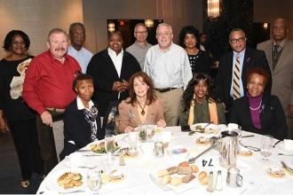 The happiness spills over to another table of Bronx school retirees.