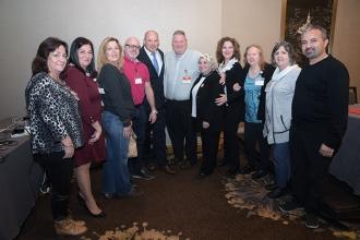 Large group of people smiling