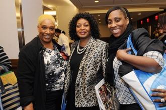Chapter Leader Shelvy Young-Abrams (center) with members.
