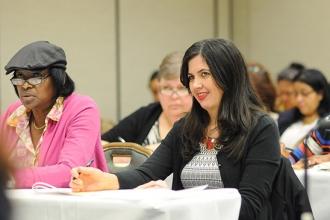 Lucitania Fernandez (right) of P10 at PS 390 in the Bronx takes notes