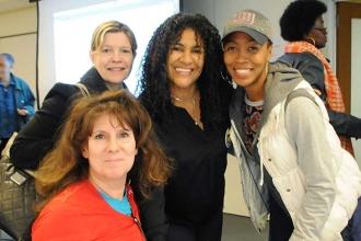 UFT District 6 Representative Mayra Cruz (second from right) with parents Esty S