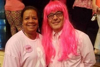 Chapter leader Diane Lucas poses in pink with her principal at PS 103 in the Bro