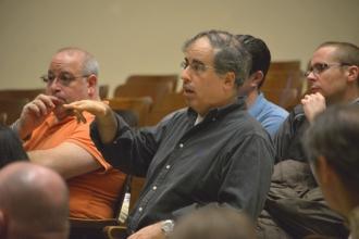 ESL teacher Ken Dornbaum raises an issue with Mulgrew.