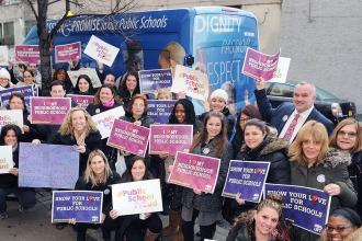 The staff of PS 239 in Ridgewood, Queens showed their love for public schools.