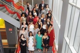 Chapter Chair Tammie Miller (third row, second from left, in white) and Vice Cha