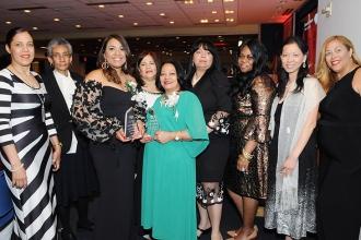 Community Champion Award winners Miguelina Suarez (third from left) and Luz Fern
