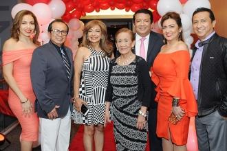 Bronx provider Carolyn Sanchez (left) with her family.