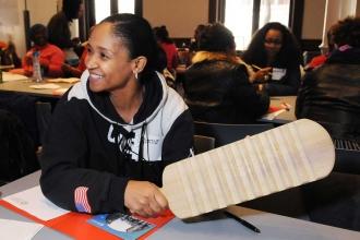 The museum gave each table colonial-era toys or tools to handle and discuss how 