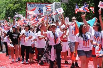 UFT marchers pass the reviewing stand as they make their way uptown.