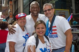 Harlem Assemblyman Keith Wright stands with Evelyn DeJesus.
