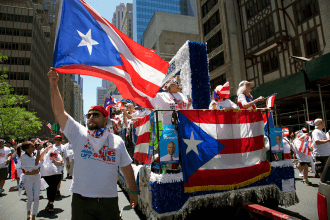 The UFT float goes up Fifth Avenue.