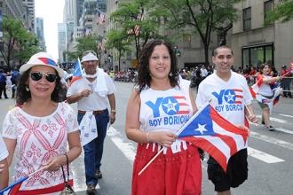 Lissette Arroyo (center), a psychologist at PS 140 in Brooklyn, along the route.