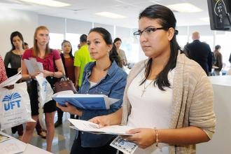 New members pick up information at the pension table.