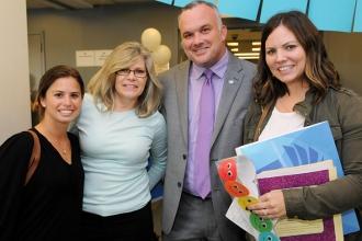 District 24 Representative John Harrington (second from right) stands with new m