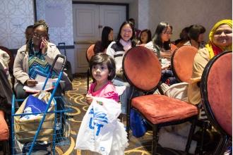Naurin Jania’s three-year old strolls with her UFT bag