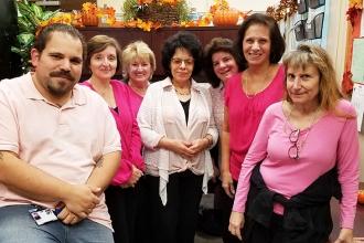 The chapter leader and school secretaries at Richmond Hill HS in Queens are show