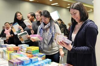 Attendees browse at the vendor tables.
