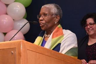 District 75 Secretary of the Year Patricia Royall of PS 169, Manhattan, addresse