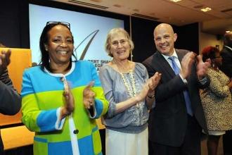 Romain, Shanker, and Mulgrew welcome the scholarship winners. 