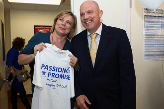 Svetlana Buenoamino, an occupational therapist in District 75, displays her new 