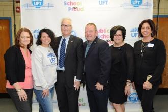 Six people posing for the camera