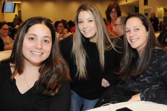 Smiling for the camera during a break between sessions are (from left) Erica Dia