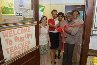 Sharing in the ribbon cutting are (from left) Fogel, Principal Temica Francis, U