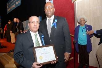 Robert Fernandez (left) with UFT Assistant Secretary LeRoy Barr.