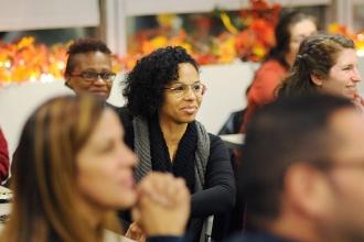 Astrid Moises listens to Mulgrew’s talk.