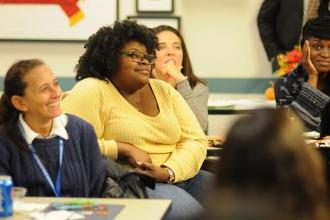 Members share stories and laugh.