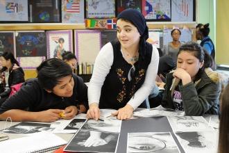 Gehan Habashy helps students create self-portraits overlaid with identity poems 