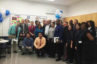 Chapter Leader Vance Gillenwater (melon-colored shirt) poses with his colleagues