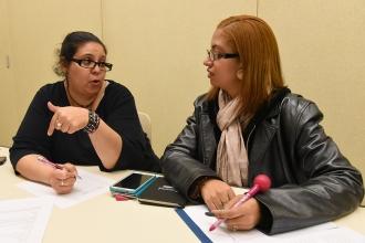 Parents share ideas and engage in discussion during a workshop.