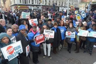 UFTers gather at the Harlem rally against gun violence.