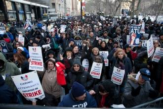 A lively rally at City Hall follows the march.