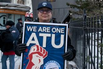 Winograd, a music teacher at PS 6 in Manhattan, shows her solidarity with the st